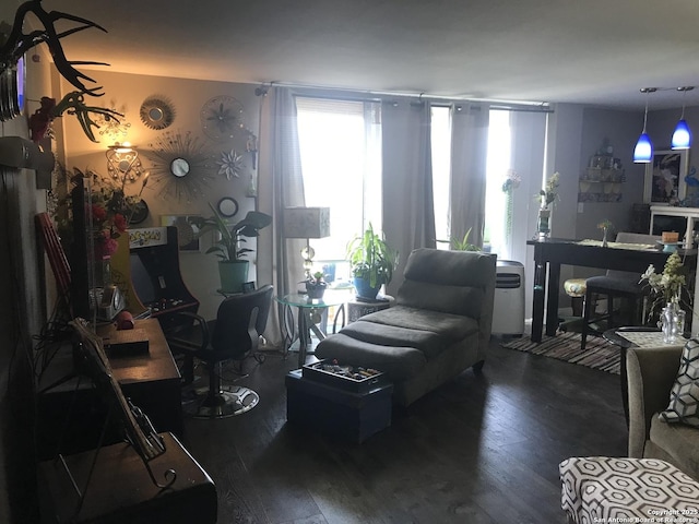 7039 San Pedro Unit 810, San Antonio, TX 78216 - sitting room featuring wood finished floors and a wealth of natural light