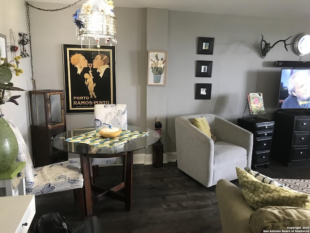 7039 San Pedro Unit 810, San Antonio, TX 78216 - interior space featuring baseboards, dark wood-style floors, and a notable chandelier