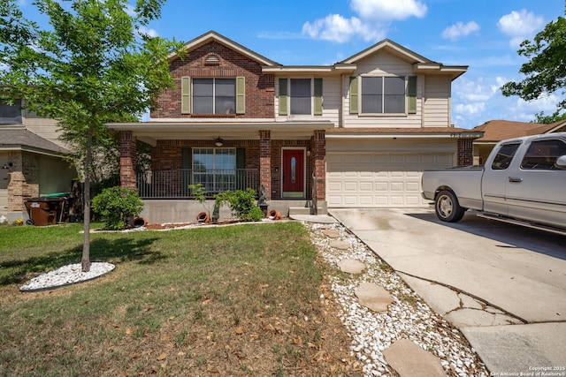 traditional home featuring an attached garage, brick siding, a front yard, covered porch, and driveway