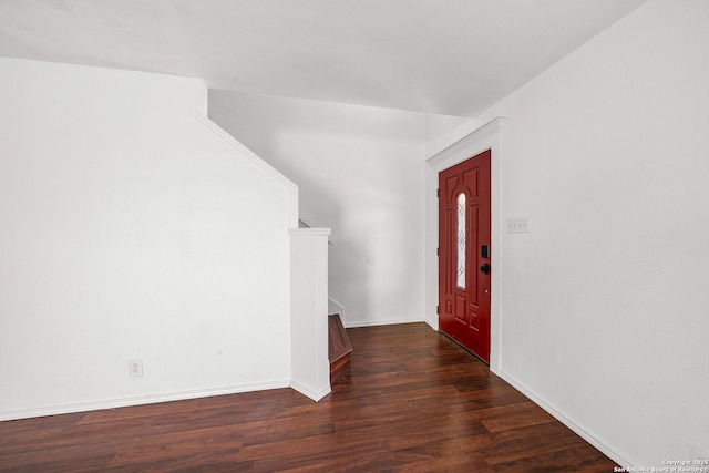 entrance foyer with baseboards and dark wood-style flooring