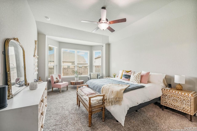 carpeted bedroom featuring a ceiling fan