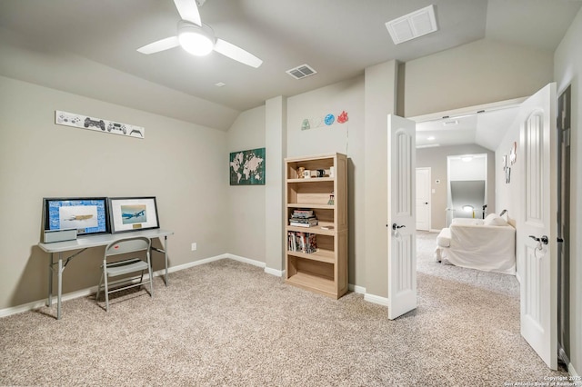 office with visible vents, a ceiling fan, carpet, and lofted ceiling