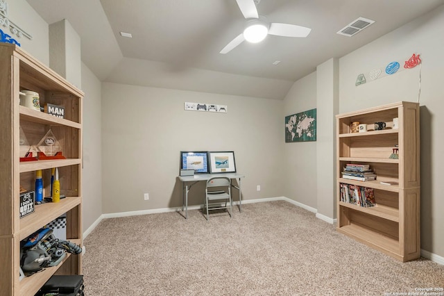 office with visible vents, lofted ceiling, light carpet, baseboards, and ceiling fan
