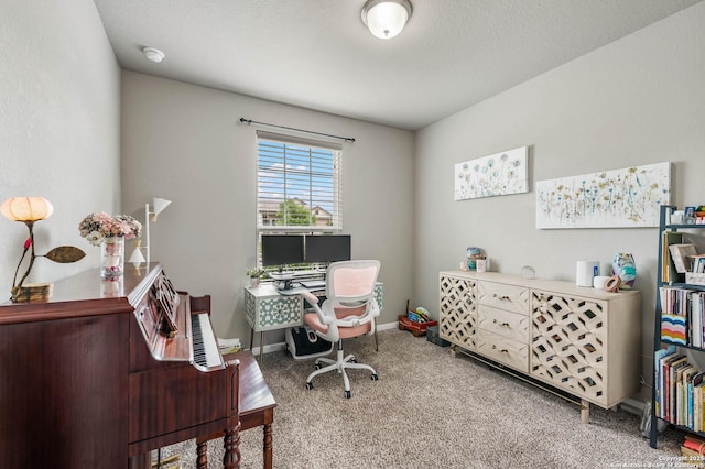 carpeted office with baseboards
