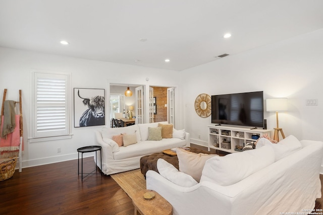 living area with visible vents, recessed lighting, dark wood finished floors, and baseboards