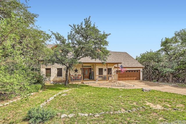 27030 Vaughns Vw, San Antonio, TX 78260 - view of front of house with a garage, a front lawn, covered porch, stone siding, and concrete driveway