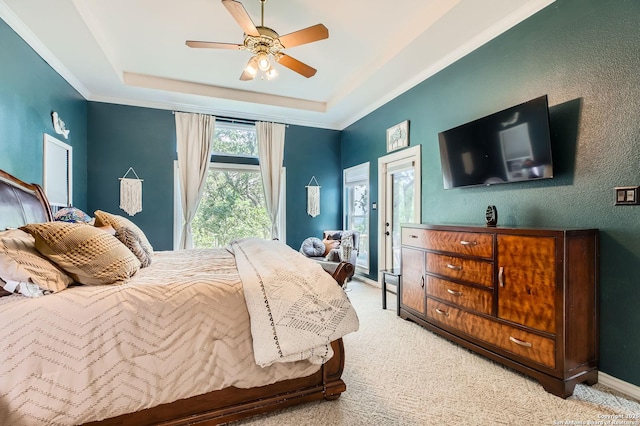 27030 Vaughns Vw, San Antonio, TX 78260 - bedroom featuring light colored carpet, ceiling fan, a tray ceiling, and access to exterior