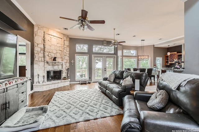 27030 Vaughns Vw, San Antonio, TX 78260 - living area featuring plenty of natural light, a ceiling fan, hardwood / wood-style floors, and ornamental molding