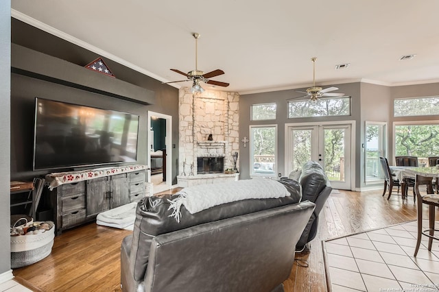 27030 Vaughns Vw, San Antonio, TX 78260 - living area with crown molding, a ceiling fan, hardwood / wood-style flooring, and visible vents