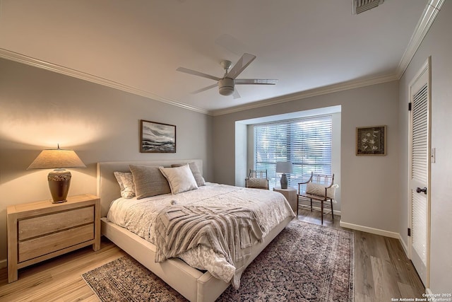 13402 Vista Del Mar, San Antonio, TX 78216 - bedroom with baseboards, ornamental molding, light wood-style flooring, and visible vents