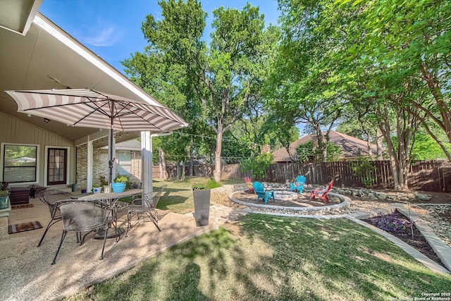 13402 Vista Del Mar, San Antonio, TX 78216 - view of yard with a fenced backyard, a patio, and an outdoor fire pit