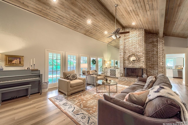 13402 Vista Del Mar, San Antonio, TX 78216 - living area featuring beam ceiling, a fireplace, high vaulted ceiling, a ceiling fan, and wood ceiling