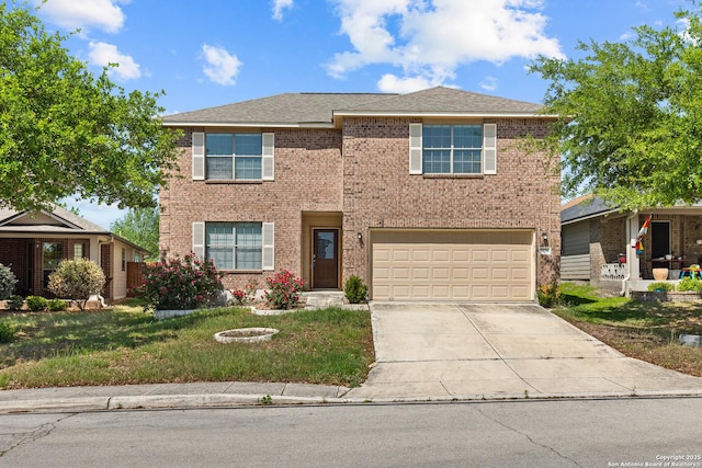 traditional-style home with brick siding, an attached garage, driveway, and a front lawn