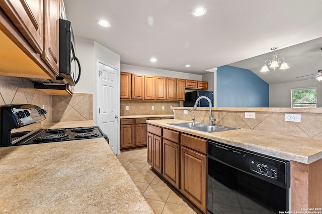 kitchen featuring a sink, black dishwasher, light countertops, tasteful backsplash, and electric stove