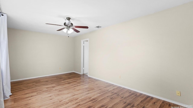 3634 Ridge Cluster, San Antonio, TX 78247 - empty room with visible vents, baseboards, ceiling fan, and wood finished floors