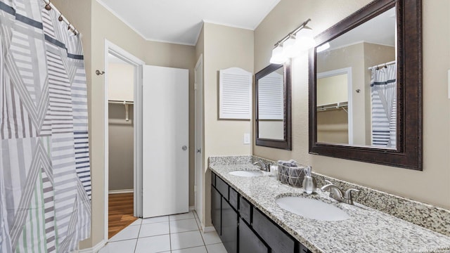 3634 Ridge Cluster, San Antonio, TX 78247 - bathroom featuring a sink, tile patterned flooring, ornamental molding, and double vanity