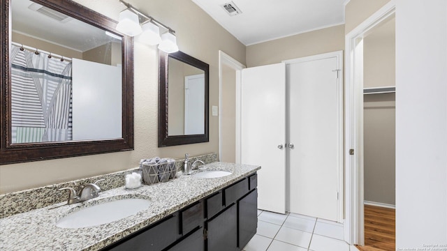 3634 Ridge Cluster, San Antonio, TX 78247 - bathroom featuring a sink, double vanity, and visible vents