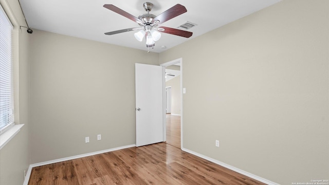 3634 Ridge Cluster, San Antonio, TX 78247 - unfurnished bedroom with baseboards, ceiling fan, wood finished floors, and visible vents