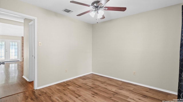 3634 Ridge Cluster, San Antonio, TX 78247 - spare room with baseboards, a ceiling fan, wood finished floors, and visible vents