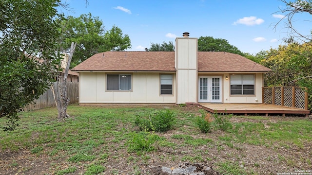 3634 Ridge Cluster, San Antonio, TX 78247 - rear view of property featuring a wooden deck, fence, french doors, a chimney, and a shingled roof