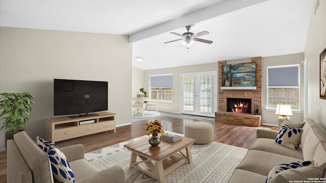 3634 Ridge Cluster, San Antonio, TX 78247 - living room with wood finished floors, a fireplace, baseboards, ceiling fan, and lofted ceiling with beams