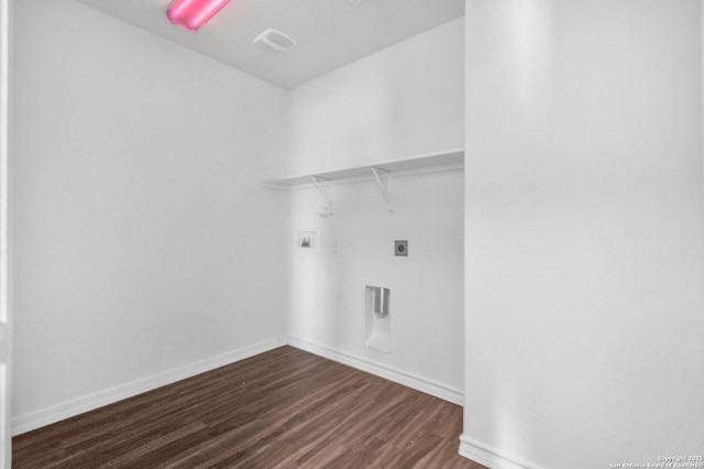 washroom with laundry area, visible vents, dark wood-style flooring, baseboards, and hookup for an electric dryer