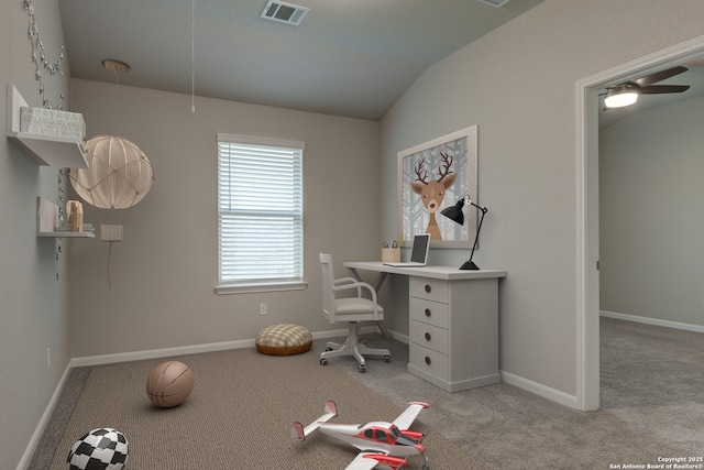 office area featuring carpet flooring, baseboards, visible vents, and vaulted ceiling