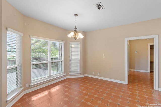 29303 Sumpter Dr, Boerne, TX 78015 - spare room with visible vents, light floors, baseboards, and a notable chandelier
