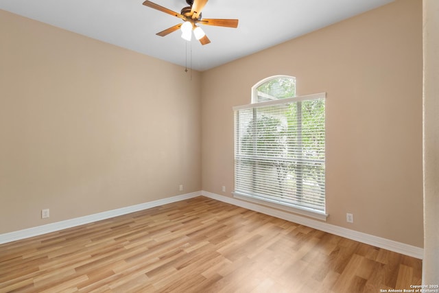 29303 Sumpter Dr, Boerne, TX 78015 - spare room featuring light wood-style floors, baseboards, and a ceiling fan