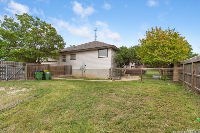 29303 Sumpter Dr, Boerne, TX 78015 - rear view of house with a fenced backyard and a lawn