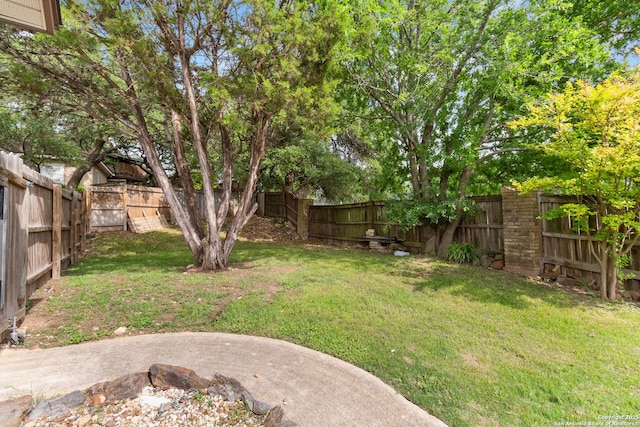 29303 Sumpter Dr, Boerne, TX 78015 - view of yard featuring a fenced backyard and a patio area