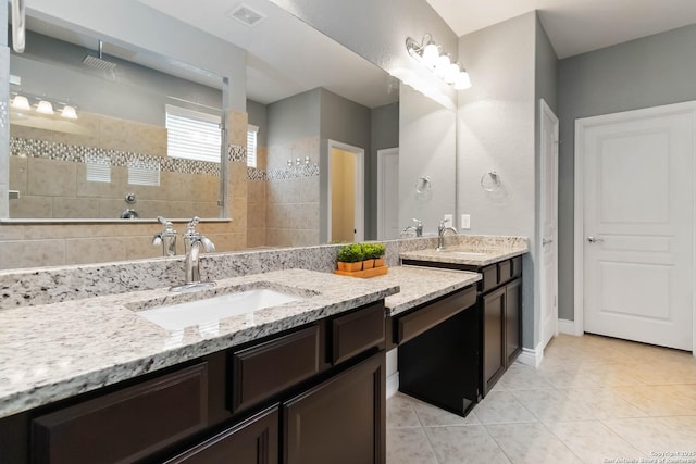 full bath featuring visible vents, walk in shower, tile patterned flooring, and vanity