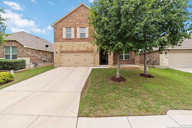 view of front of home with an attached garage, stone siding, a front yard, and concrete driveway