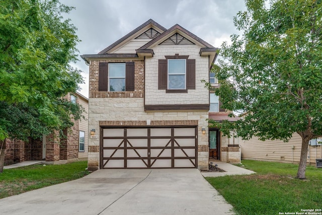 craftsman inspired home featuring a garage, concrete driveway, a front lawn, and stone siding