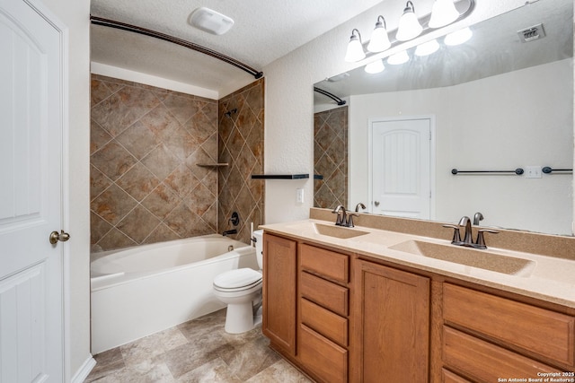 bathroom with toilet, visible vents, a sink, and bathtub / shower combination