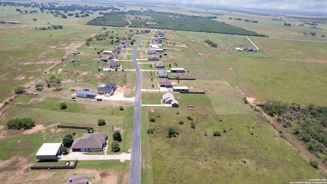 birds eye view of property featuring a rural view