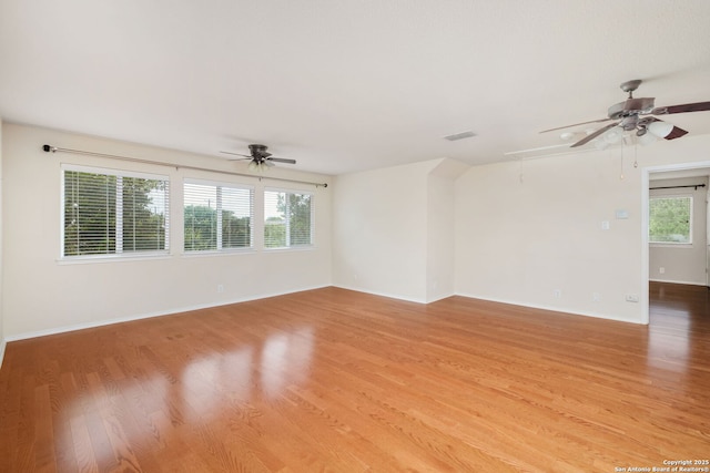 5803 Sugarberry, San Antonio, TX 78253 - empty room with a ceiling fan, visible vents, attic access, and light wood-style floors