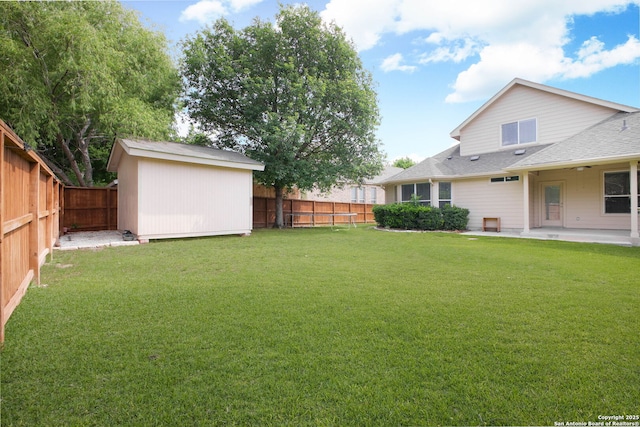 5803 Sugarberry, San Antonio, TX 78253 - view of yard featuring an outdoor structure, a patio, a fenced backyard, and a storage unit