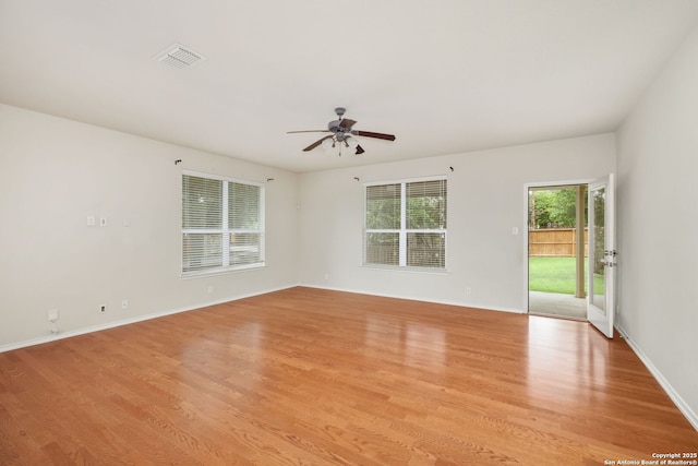 5803 Sugarberry, San Antonio, TX 78253 - unfurnished room featuring baseboards, ceiling fan, visible vents, and light wood-style flooring