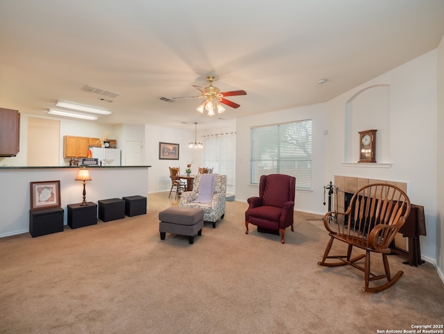 3608 Augusta Glade, Schertz, TX 78154 - sitting room with visible vents, a ceiling fan, and light carpet