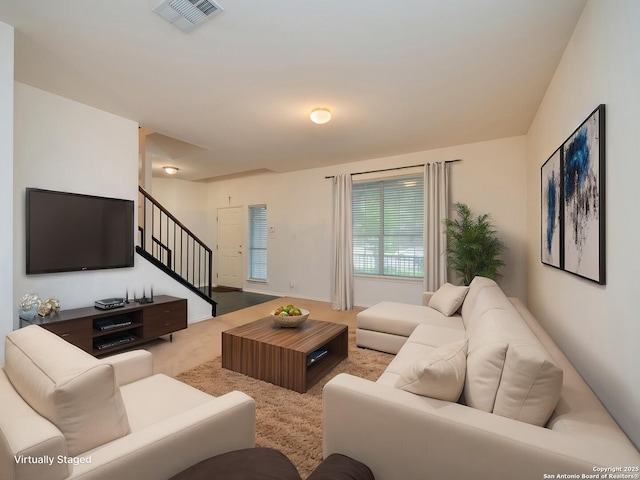 3608 Augusta Glade, Schertz, TX 78154 - carpeted living room with visible vents and stairs