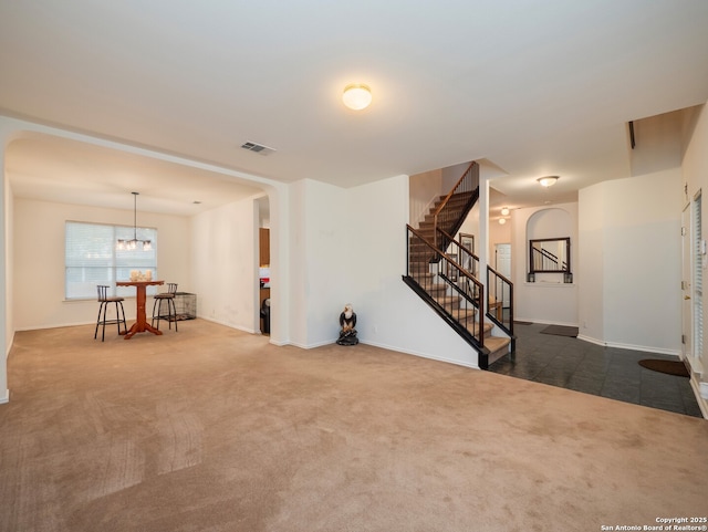 3608 Augusta Glade, Schertz, TX 78154 - interior space with visible vents, arched walkways, stairway, baseboards, and dark colored carpet