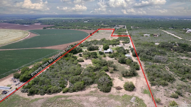 birds eye view of property featuring a rural view