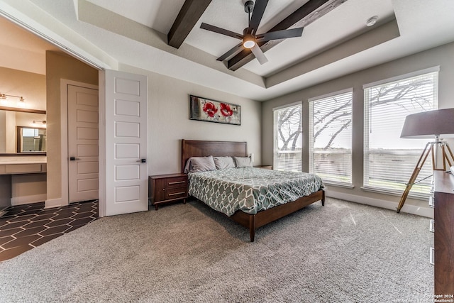 carpeted bedroom with baseboards, a ceiling fan, and beam ceiling
