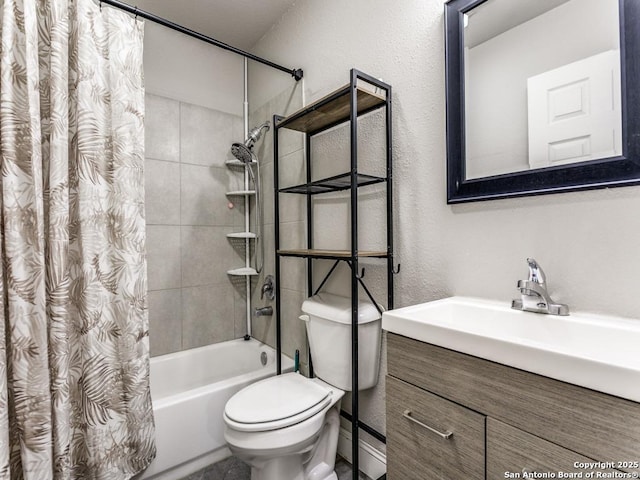 bathroom with vanity, a textured wall, toilet, a baseboard radiator, and shower / tub combo