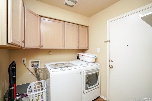 laundry area featuring cabinet space and independent washer and dryer