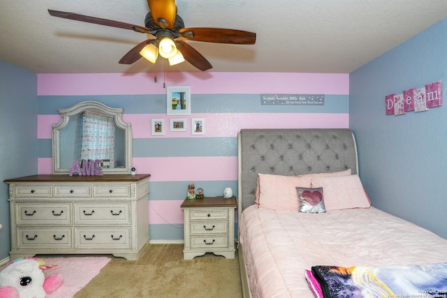 carpeted bedroom with a ceiling fan