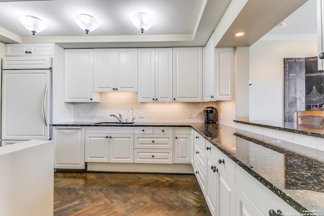 200 Patterson Unit 312, San Antonio, TX 78209 - kitchen featuring recessed lighting, a sink, white cabinets, and ornamental molding