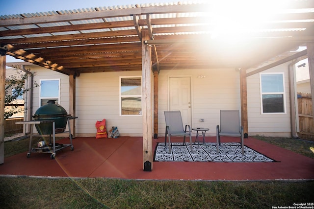 view of patio / terrace with fence and a pergola