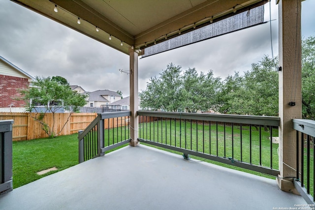 view of patio / terrace featuring fence